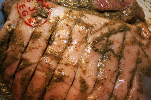 Die Paste wurde auf dem Braten verteilt Colombia Braten a la Gaumen Knall